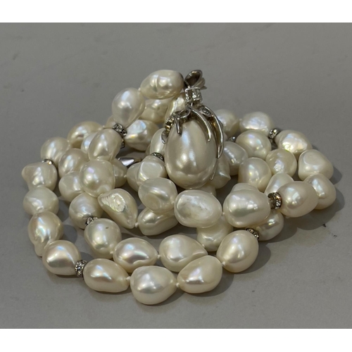 416 - A fresh water cultured pearl and cubic zirconia necklace in silver with a simulated pearl and cubic ... 