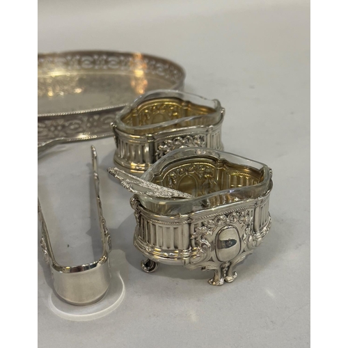 405 - A small collection of silver plated items including a small oval gallery tray, reading glass, two sa... 