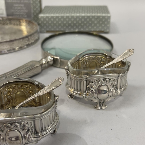 405 - A small collection of silver plated items including a small oval gallery tray, reading glass, two sa... 