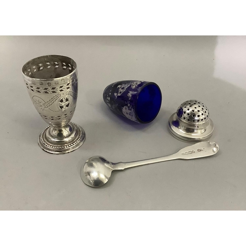 383 - A George III silver pepper pot with blue glass liner, pierced and scroll engraved with open cartouch... 