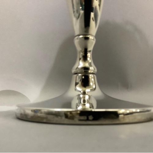 382 - A silver three branch candelabra with C scroll arms and weighted base, approximate height 20cm