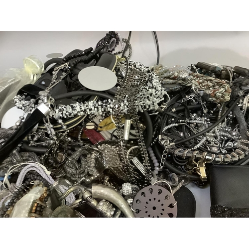 411 - A collection of costume jewellery including necklaces, key rings and bracelets variously set with po... 