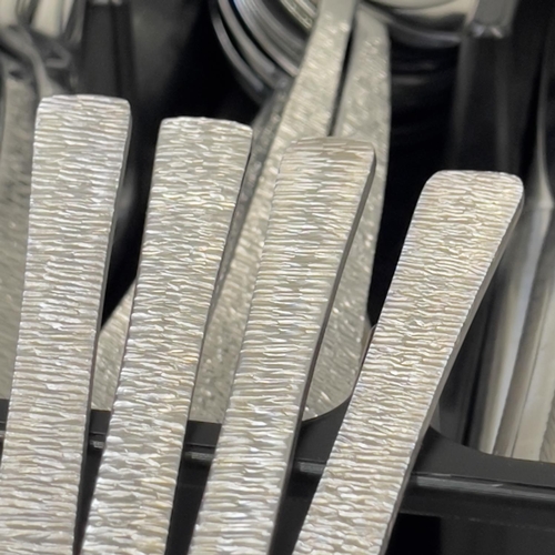 257 - A suite of Viners stainless steel cutlery including dinner knives and forks, entree knives and forks... 