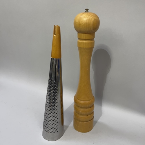 259 - A giant size pepper grinder and parmesan grater, 50cm high