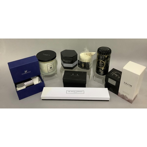 266 - A quantity of candles including The White Company long slender candles with four chrome holders, Swa... 