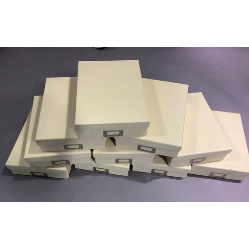 130 - A set of ten cream storage boxes with window slots, measuring 33cm x 24cm x 8cm