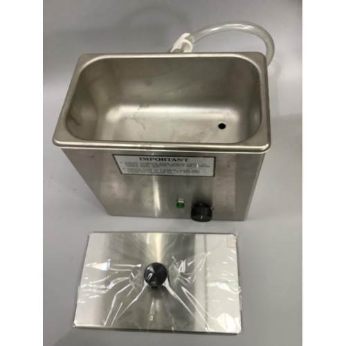 170 - An ultrasonic cleaning tank by Crest with heater and drain plus, approximate interior dimensions 23c... 