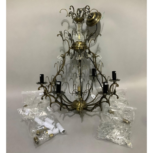 246 - A gilt metal six light chandelier, the basket frame with twelve scrolling arms, the lights alternati... 