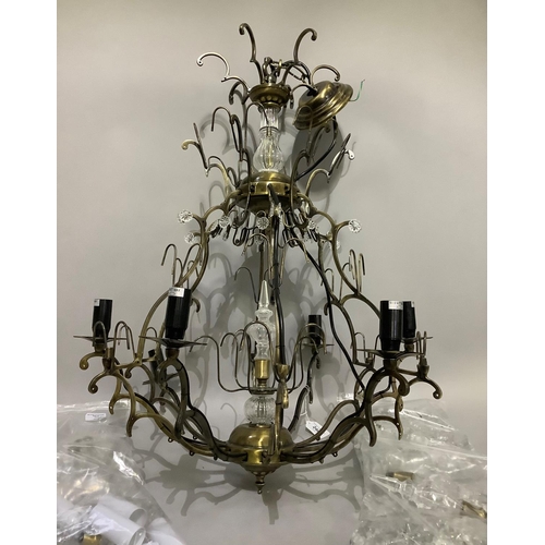 246 - A gilt metal six light chandelier, the basket frame with twelve scrolling arms, the lights alternati... 