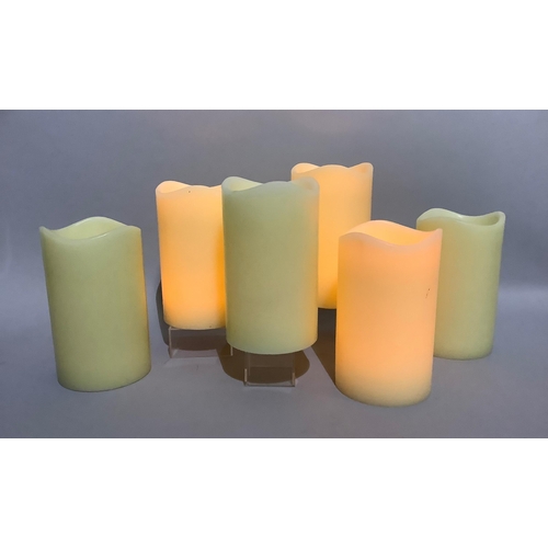 231 - A set of six large faux candle lamps with battery lights