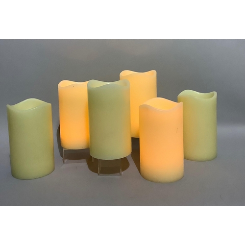 231 - A set of six large faux candle lamps with battery lights