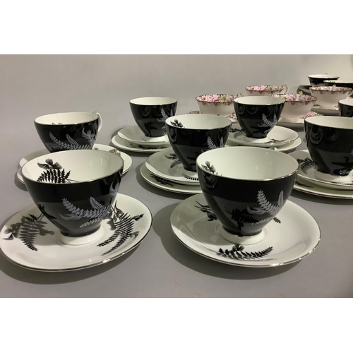 252 - A set of eight Royal Albert Night and Day cups and saucers with six tea plates, further mixed teawar... 