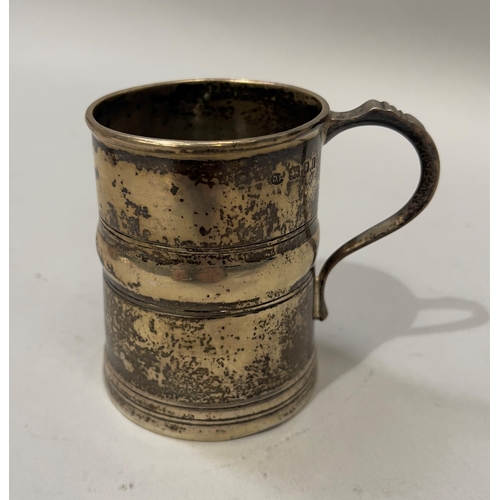 390 - An Edward VII silver tankard of girdled form with C scroll handle, hallmarked London 1906 for Josiah... 