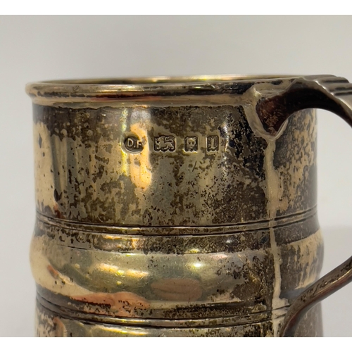 390 - An Edward VII silver tankard of girdled form with C scroll handle, hallmarked London 1906 for Josiah... 