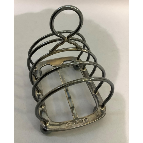 399 - A silver four section toast rack, Birmingham 1920, approximate weight 4oz