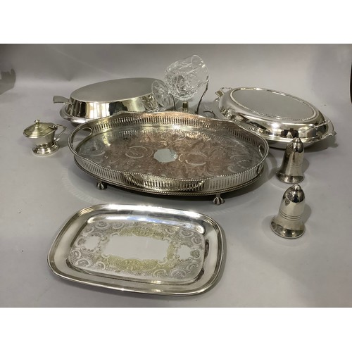 185 - Two silver plated oval entrée dishes, an oval two-handled gallery tray, a brandy warmer with glass, ... 