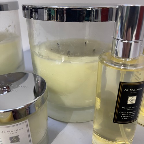 238 - Jo Malone - a set of six candles in a chrome stand, two Pine & Eucalyptus candles, unused, two 2.1kg... 