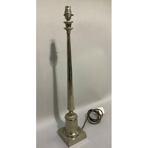 314 - A stainless steel column table lamp with tapered column and on square base, approximately 72cm to fi... 