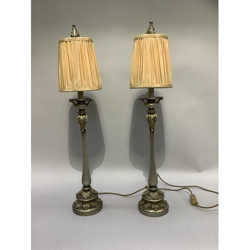 325 - A pair of silvered leaf capped table lamps with champagne coloured beaded shades, 84cm high x approx... 