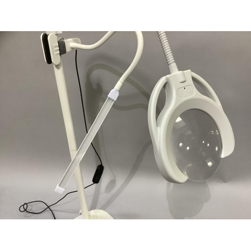 331 - A craft or reading lamp with magnifying glass and additional strip light