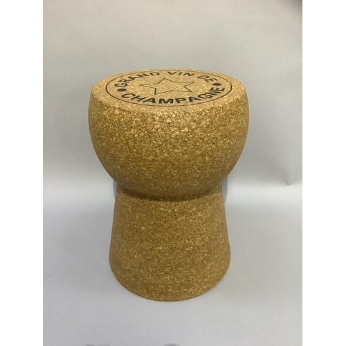 304 - A champagne cork stool, 48cm high x 32cm diameter