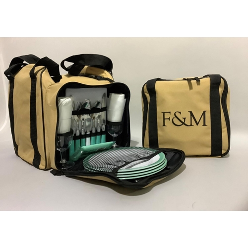 345 - A Fortnum & Mason picnic set with cooler bag and an additional picnic set for four