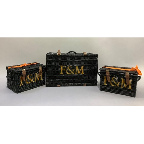 347 - Three black Fortnum & Mason wicker baskets with handles, the largest measuring 50cm wide x 32cm deep... 