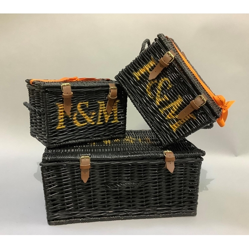 347 - Three black Fortnum & Mason wicker baskets with handles, the largest measuring 50cm wide x 32cm deep... 