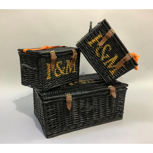 347 - Three black Fortnum & Mason wicker baskets with handles, the largest measuring 50cm wide x 32cm deep... 