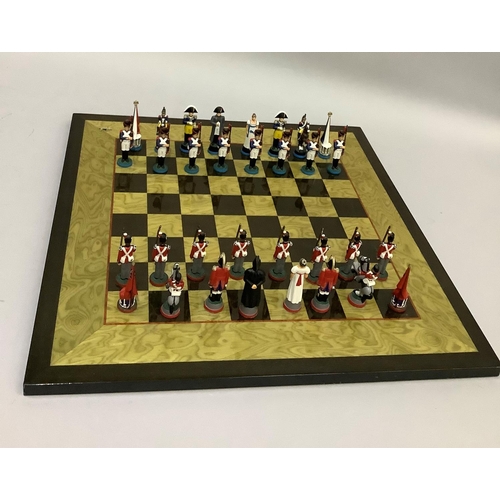 348 - A chess set of Napoleon & Wellington figures and a chess board