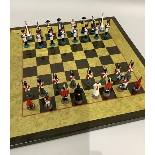 348 - A chess set of Napoleon & Wellington figures and a chess board