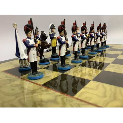 348 - A chess set of Napoleon & Wellington figures and a chess board