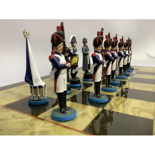 348 - A chess set of Napoleon & Wellington figures and a chess board