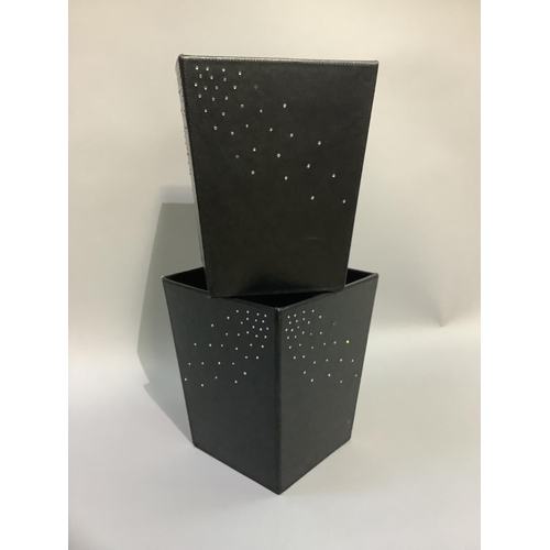 355 - A pair of black leather waste bins with scattered diamante decoration to two sides