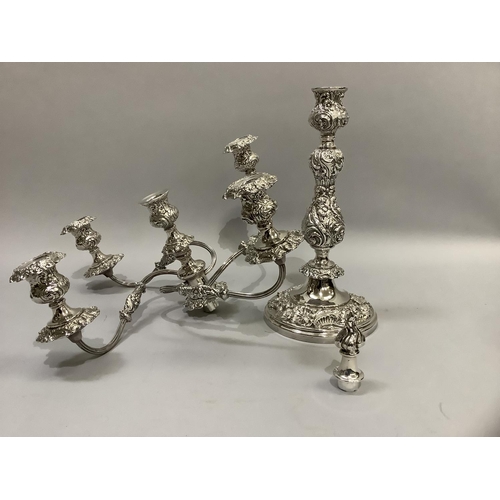 366 - A quality silver plated five light candelabra having a central baluster and foliate embossed single ... 