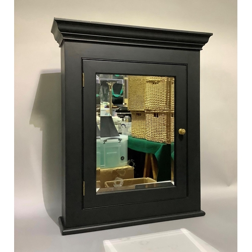 438 - A black and mirrored single door wall cabinet with bevelled mirrored door, 62cm wide x 14cm deep x 7... 