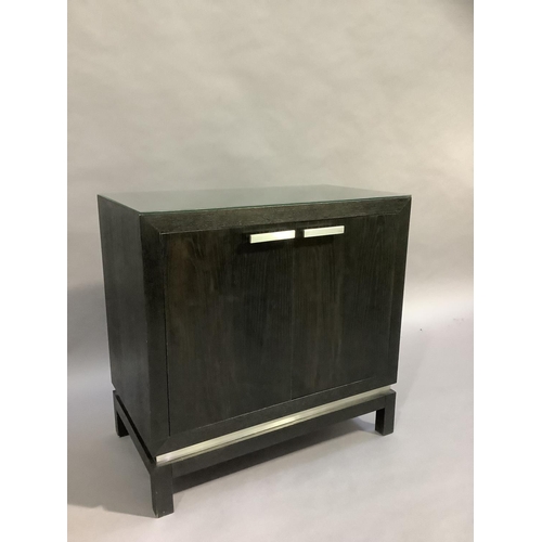 453 - A black ash two door cupboard with brushed steel handles, on square legs, 80cm wide x 45cm deep x 78... 