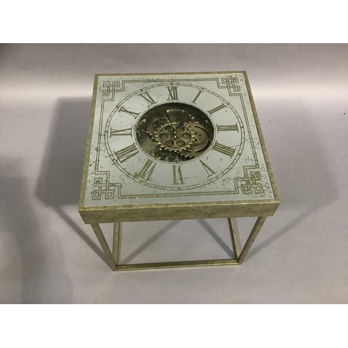 454 - A gilt metal and mirrored clock face side table on square legs, 51cm square x 51cm high