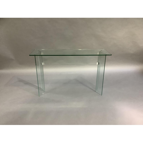 456 - A glass console table of rectangular form, on glass V-shaped supports, 120cm wide x 40cm deep x 74cm... 