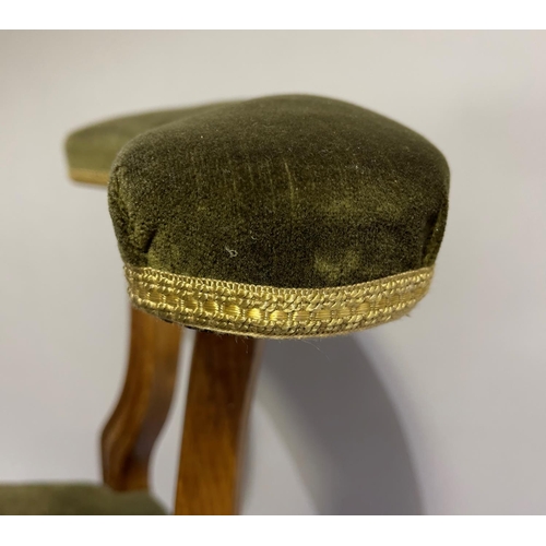 465 - A Victorian olive green velvet upholstered prie dieu chair, with low back, on cabriole legs with cer... 