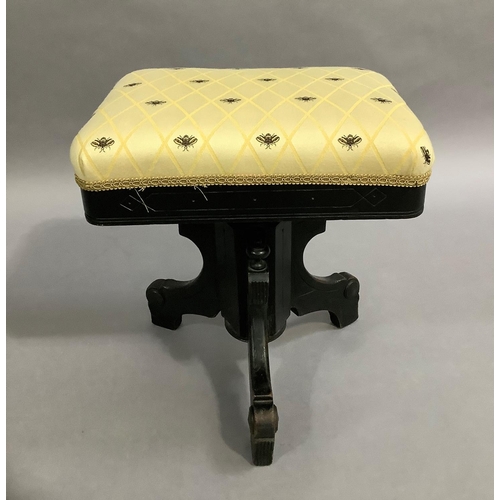 470 - A Victorian ebonised piano stool with rectangular swivel top, upholstered in bee fabric