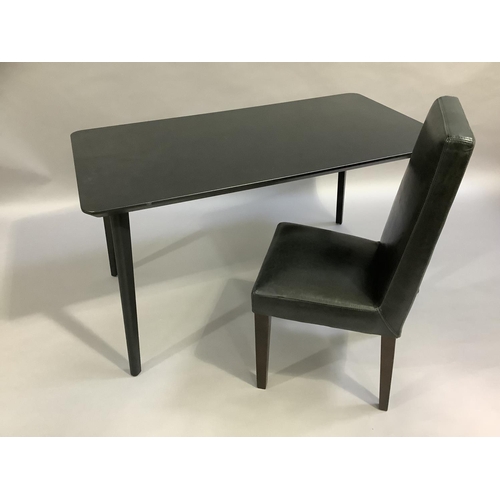 451 - A black ash finished rectangular dining table and rounded splayed legs measuring 140cm x 78cm, toget... 