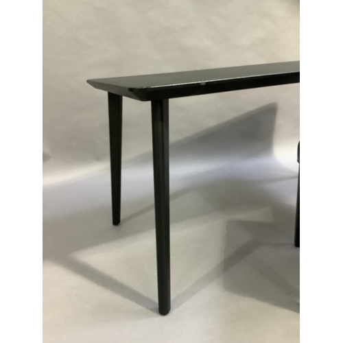 451 - A black ash finished rectangular dining table and rounded splayed legs measuring 140cm x 78cm, toget... 