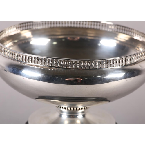 195 - A GEORGE V SILVER ROSE BOWL of plain form with pierced gallery and conforming pedestal foot, hallmar... 