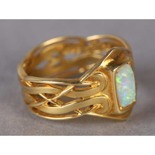 291 - AN OPAL RING BY ARCHIBALD KNOX (1864-1933) FOR LIBERTY & CO in 18ct gold, C.1901, the rectangular op... 