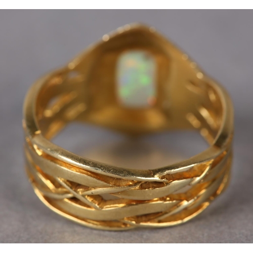 291 - AN OPAL RING BY ARCHIBALD KNOX (1864-1933) FOR LIBERTY & CO in 18ct gold, C.1901, the rectangular op... 