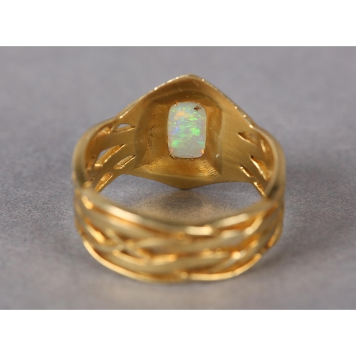 291 - AN OPAL RING BY ARCHIBALD KNOX (1864-1933) FOR LIBERTY & CO in 18ct gold, C.1901, the rectangular op... 