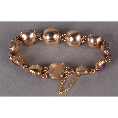 293 - A SUITE OF EARLY VICTORIAN AMETHYST BRACELET AND BROOCH in 15ct gold, each bracelet link with a sing... 