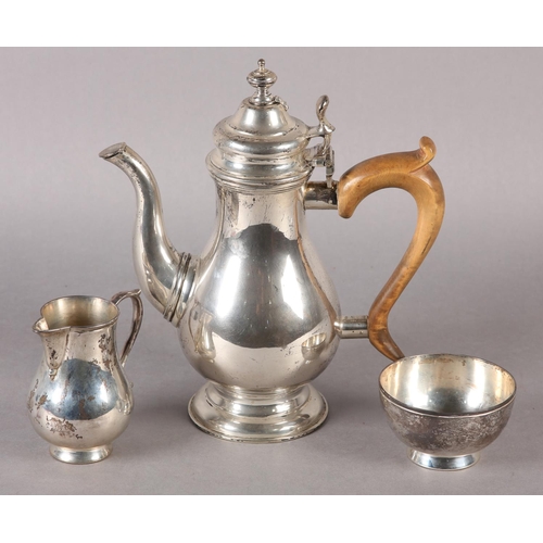 236 - A SILVER THREE PIECE COFFEE SET baluster outline on a plain circular foot, the coffee pot with hinge... 