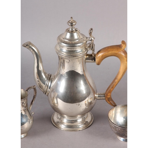 236 - A SILVER THREE PIECE COFFEE SET baluster outline on a plain circular foot, the coffee pot with hinge... 